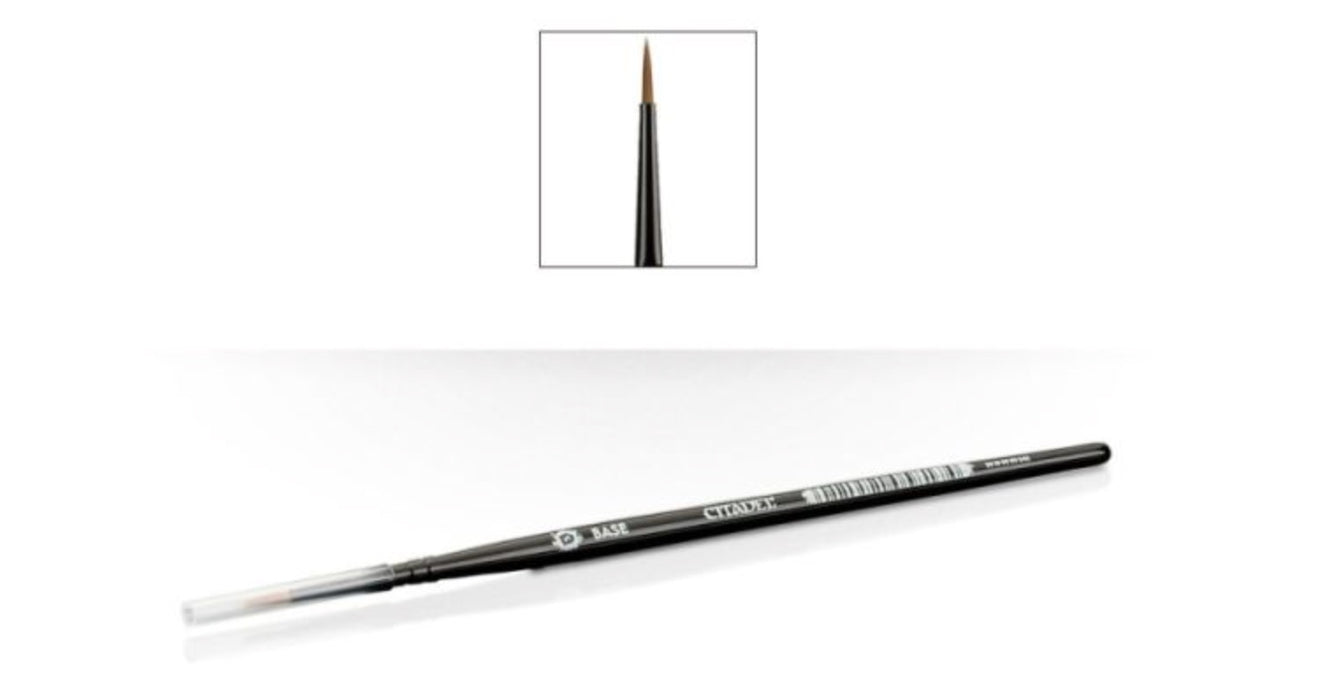 Black makeup brush with close-up inset on a white background