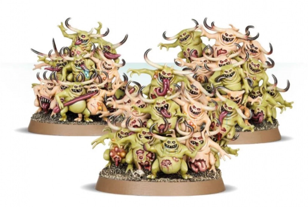 Set of fantasy monster figurines on a white background