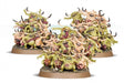 Set of fantasy monster figurines on a white background
